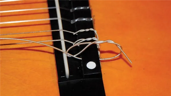 Замена гитарных струн: пошаговая инструкция 6