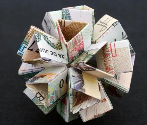 Оригами из денег своими руками — пошаговые мастер-классы, как сделать конверт, сердечки, рубашку, корону, цветок 4