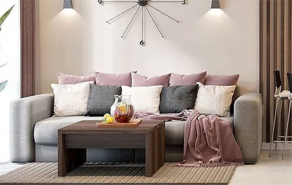 Диван можно декорировать небольшими подушками разных цветов