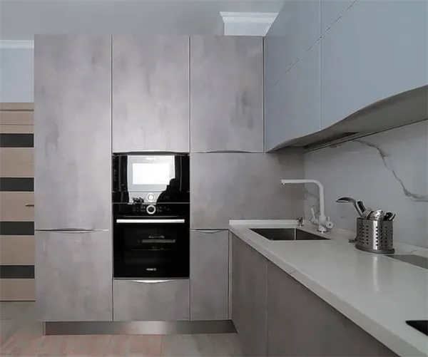 Дизайн угловой кухни в современном стиле минимализм под бетон