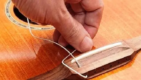 Замена гитарных струн: пошаговая инструкция 10